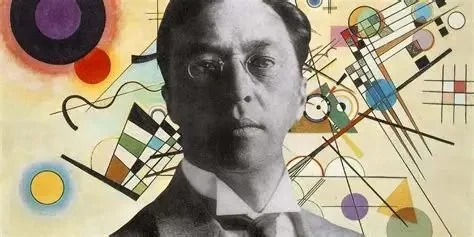 Wassily Kandinsky, with one of his paintings