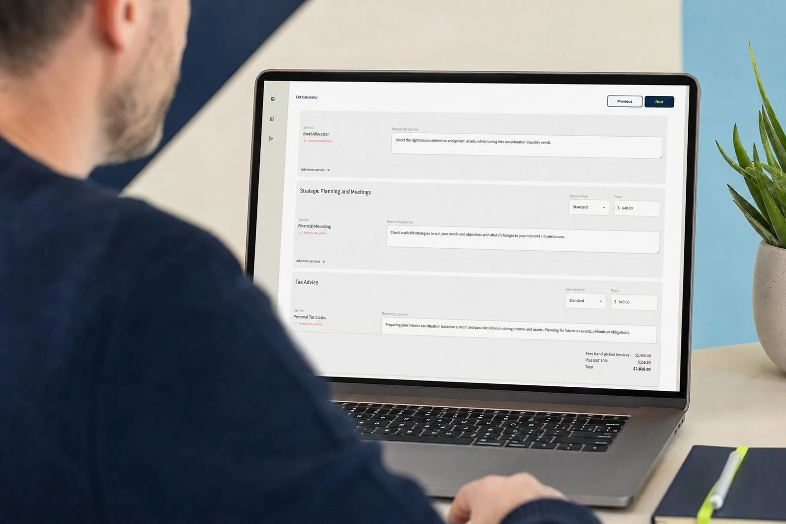 An adviser reviewing hand-picked services and totals in the Finwise Calculator