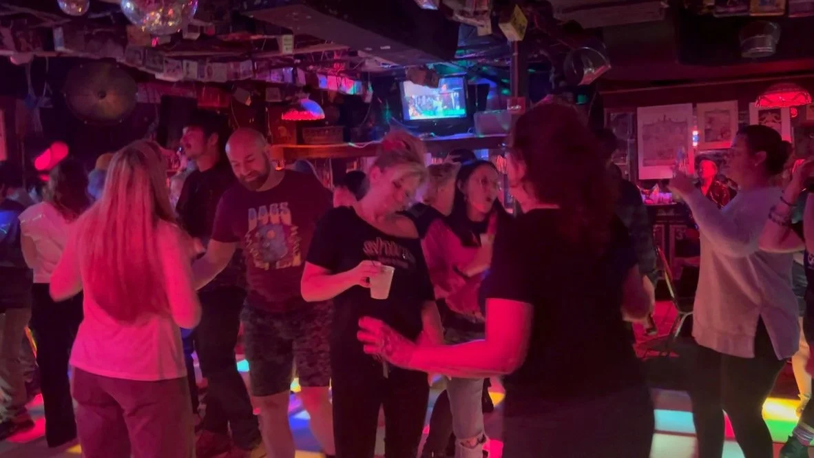 Unicorn Weekend participants dancing together at Bubba’s in 2024