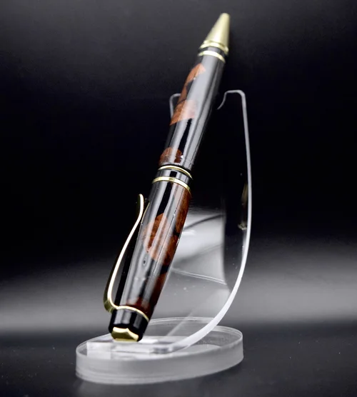 Dark resin, gold hardware