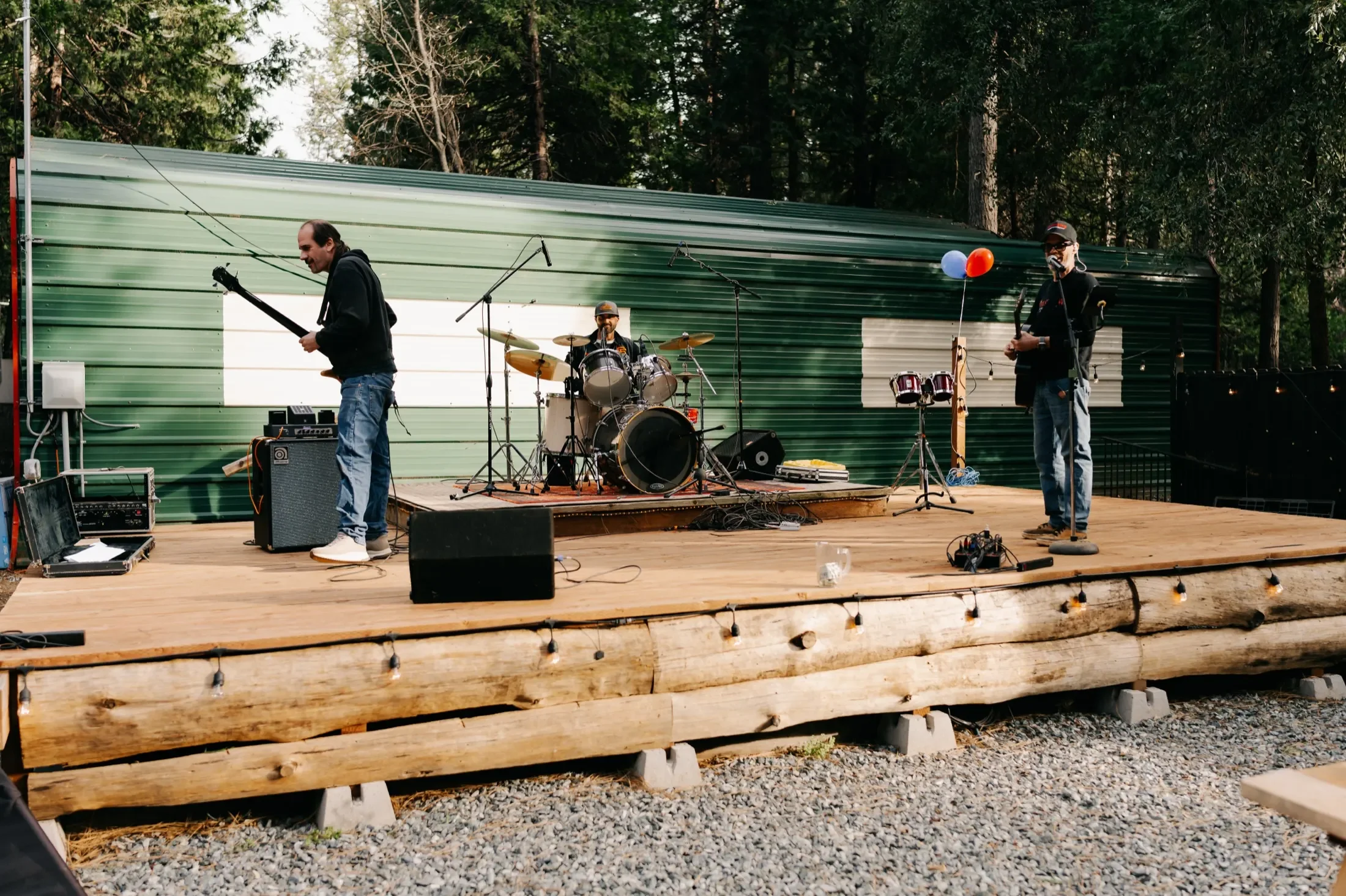 Live band performing on the outdoor Fox Sparrow stage