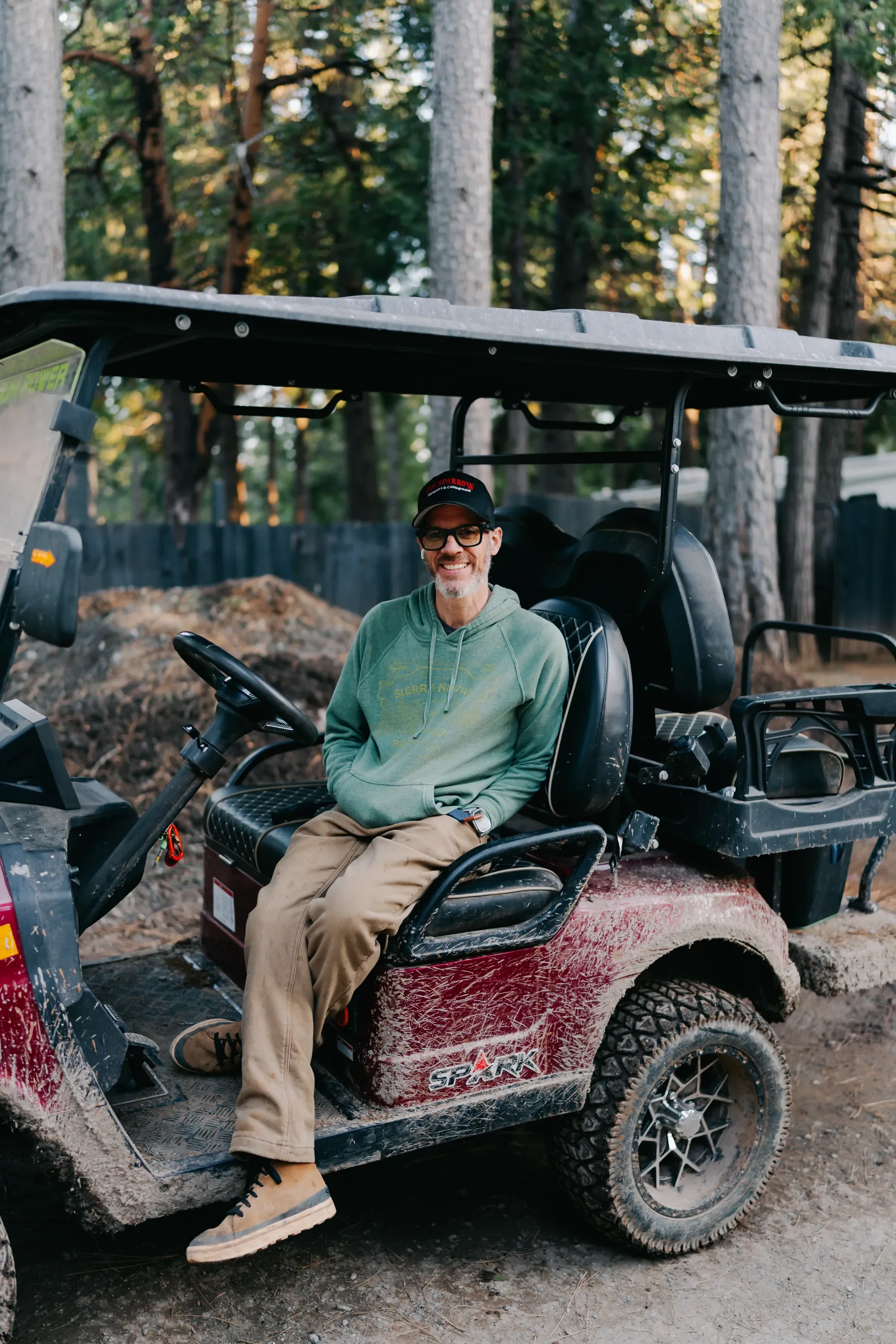 Troy seated on the Fox Sparrow golf cart