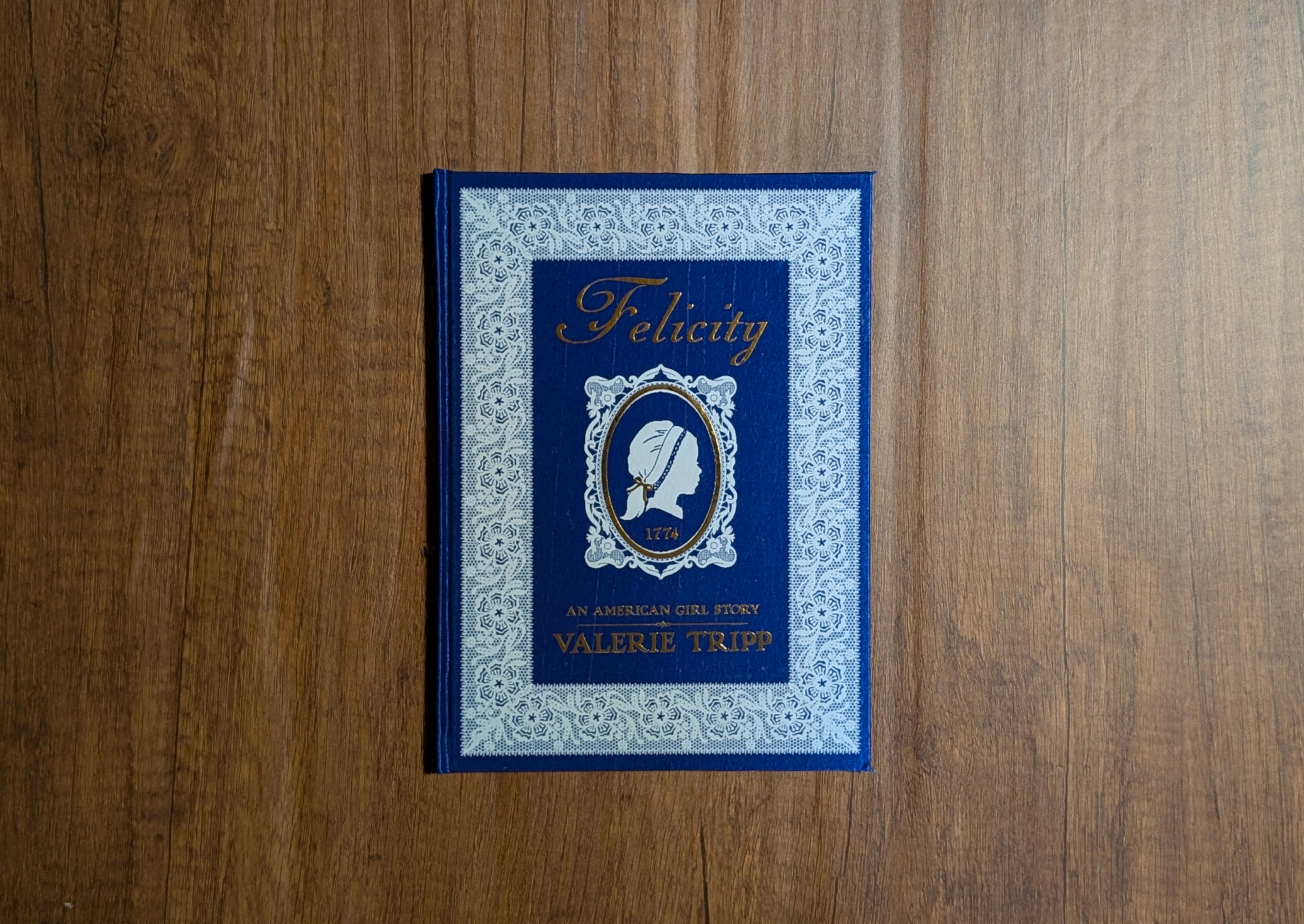 The same Felicity book three hours later, rebound as a custom cloth hardcover.