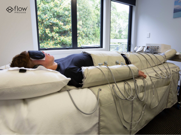 A Solutions Functional Medicine provider reviewing a patient's health history before treatment.