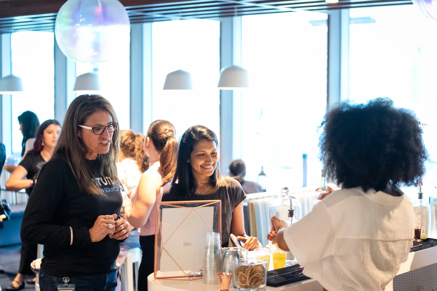 Reception counter at Toronto Tech Week, photographed by Uptown Media