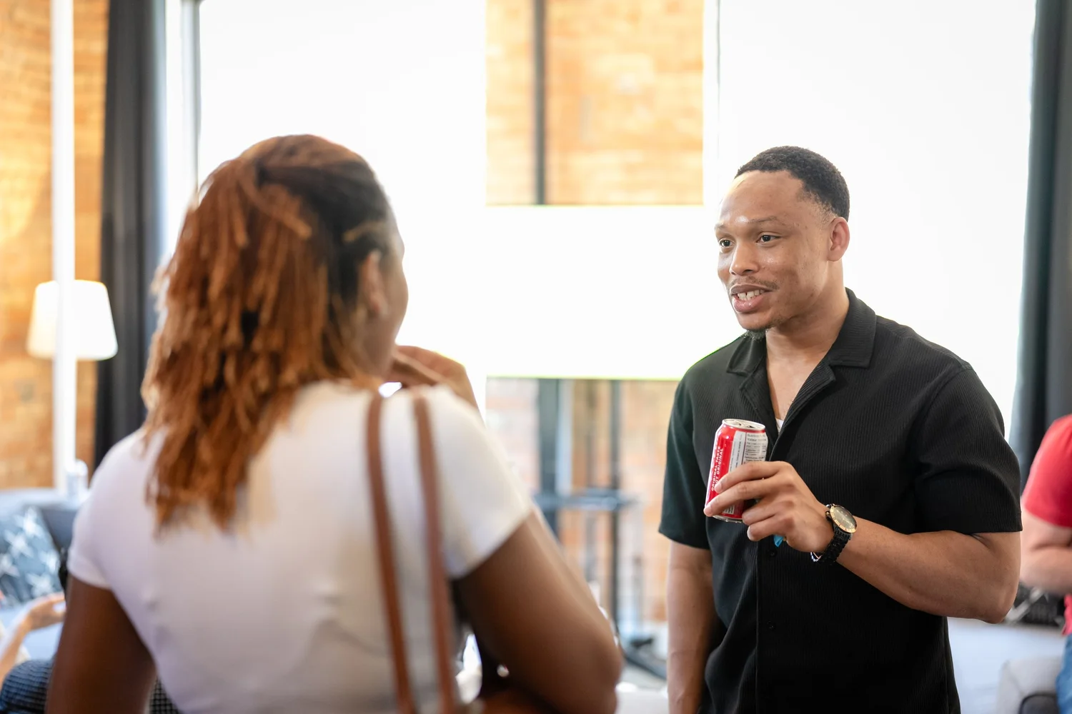 Networking conversation at Toronto Tech Week, photographed by Uptown Media