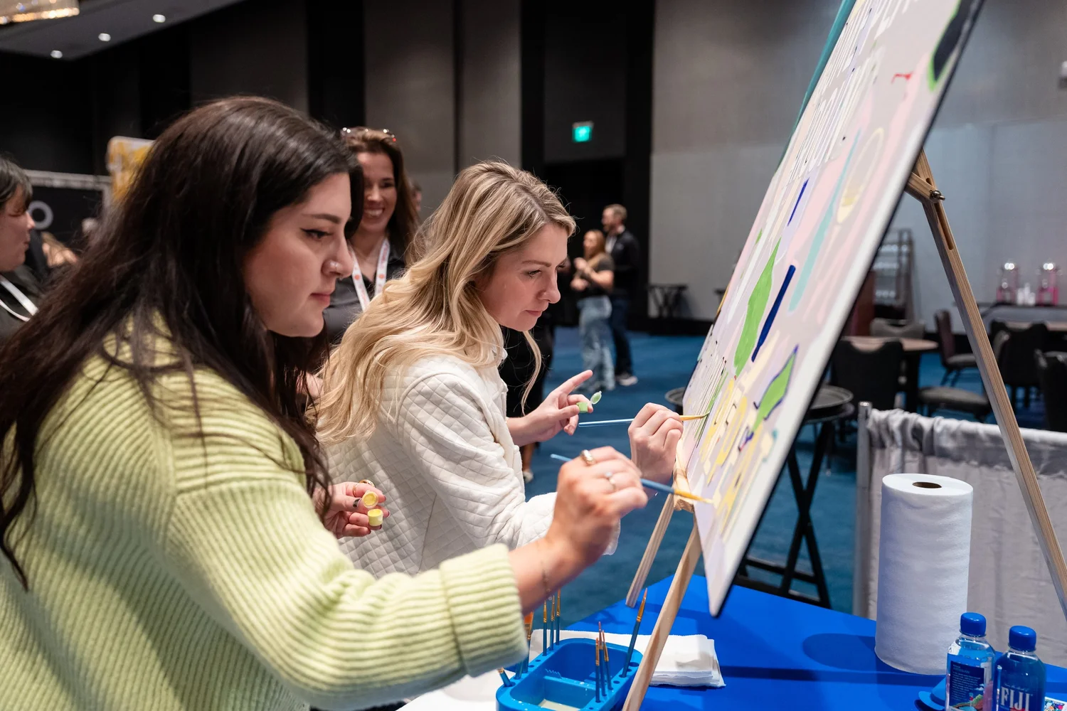 Painting activity at Topgolf Maker 2026, photographed by Uptown Media