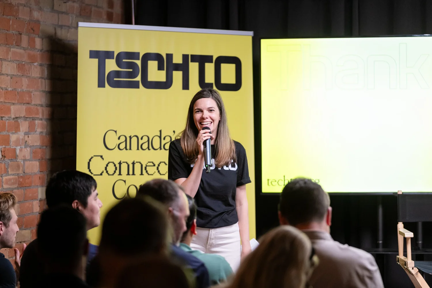Speaker on stage at Toronto Tech Week, photographed by Uptown Media