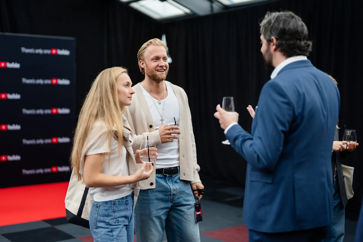 Reception conversation at YouTube Features 2025, photographed by Uptown Media