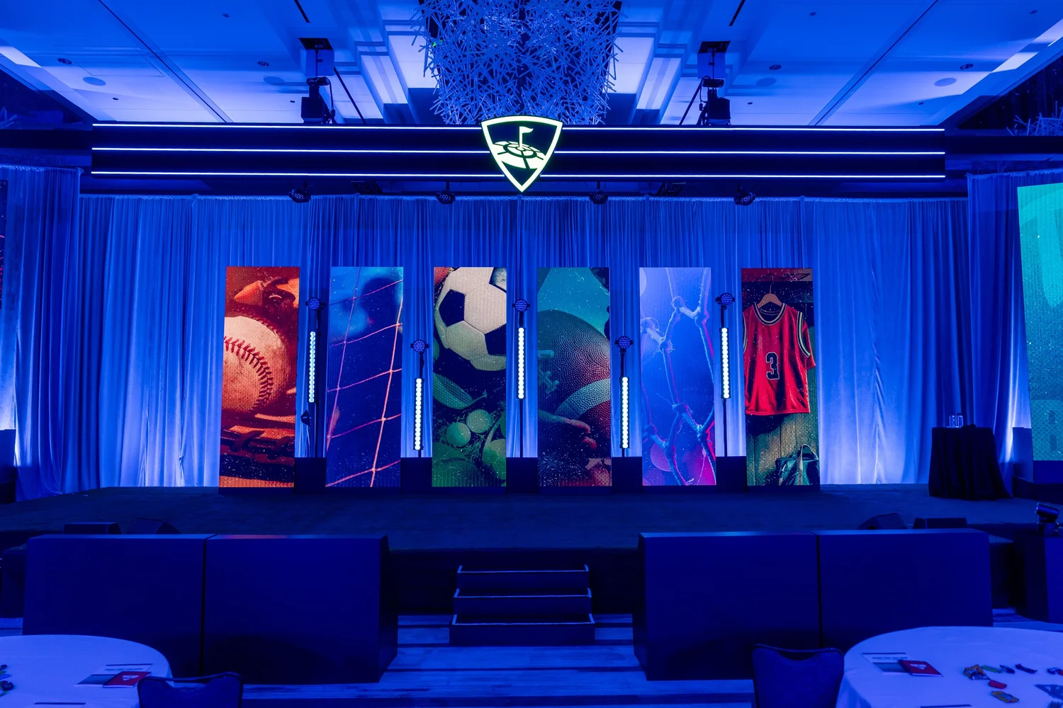 Stage design at Topgolf Maker 2026, photographed by Uptown Media