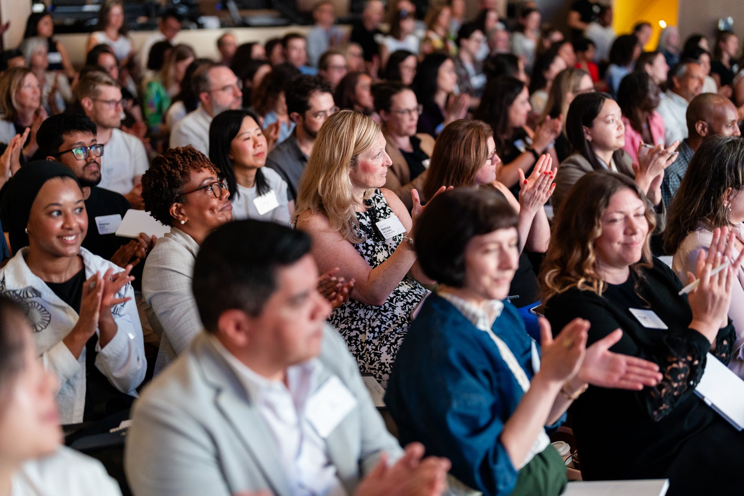 Guests applauding during the Google for Nonprofits conference