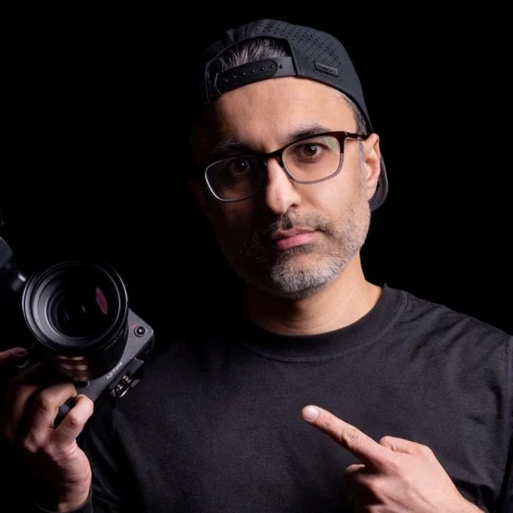 Neel Dhingra holding a cinema camera