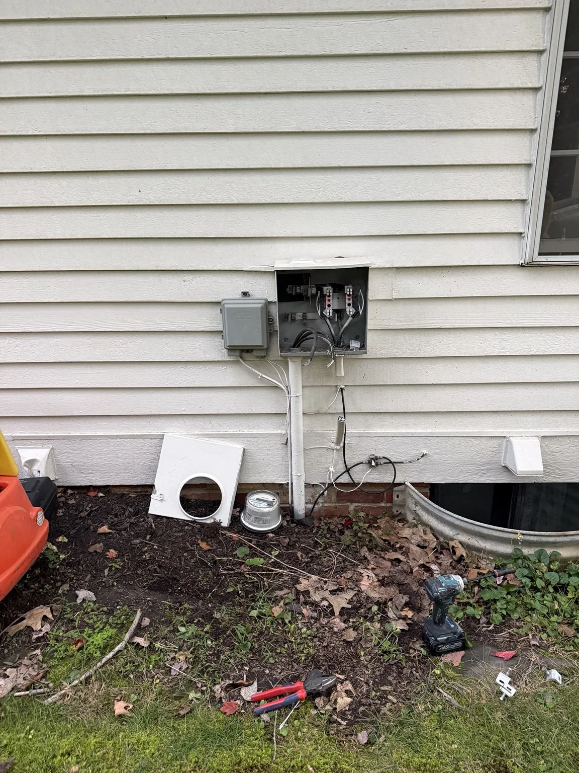 Original exterior meter socket during removal with the meter out before the service equipment was replaced