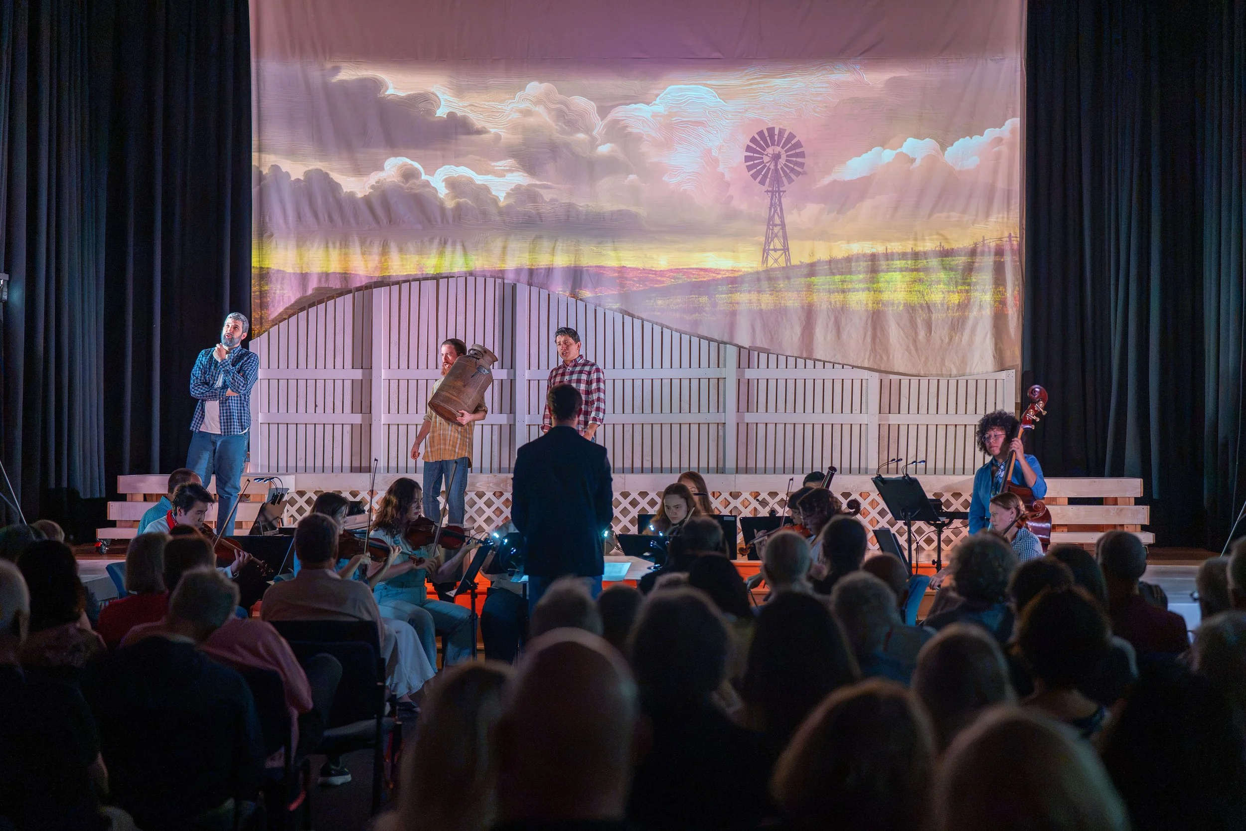 Cast performing on stage in The Tender Land at Temple Har Shalom