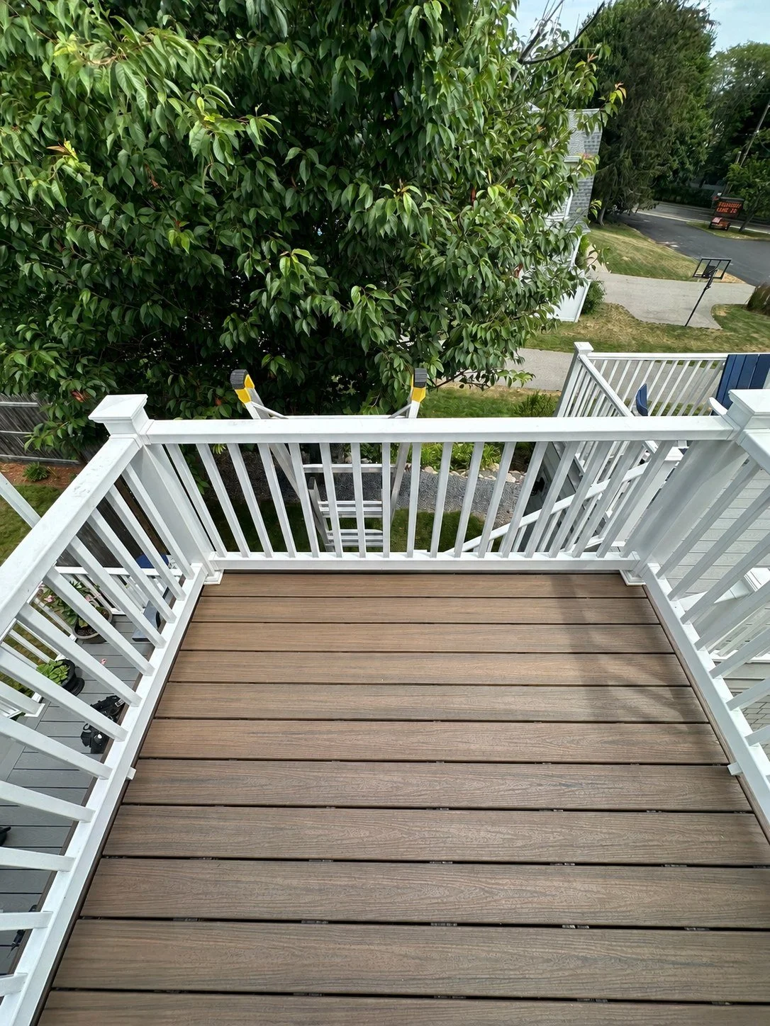 Composite landing and white railing, with photographer shoes removed