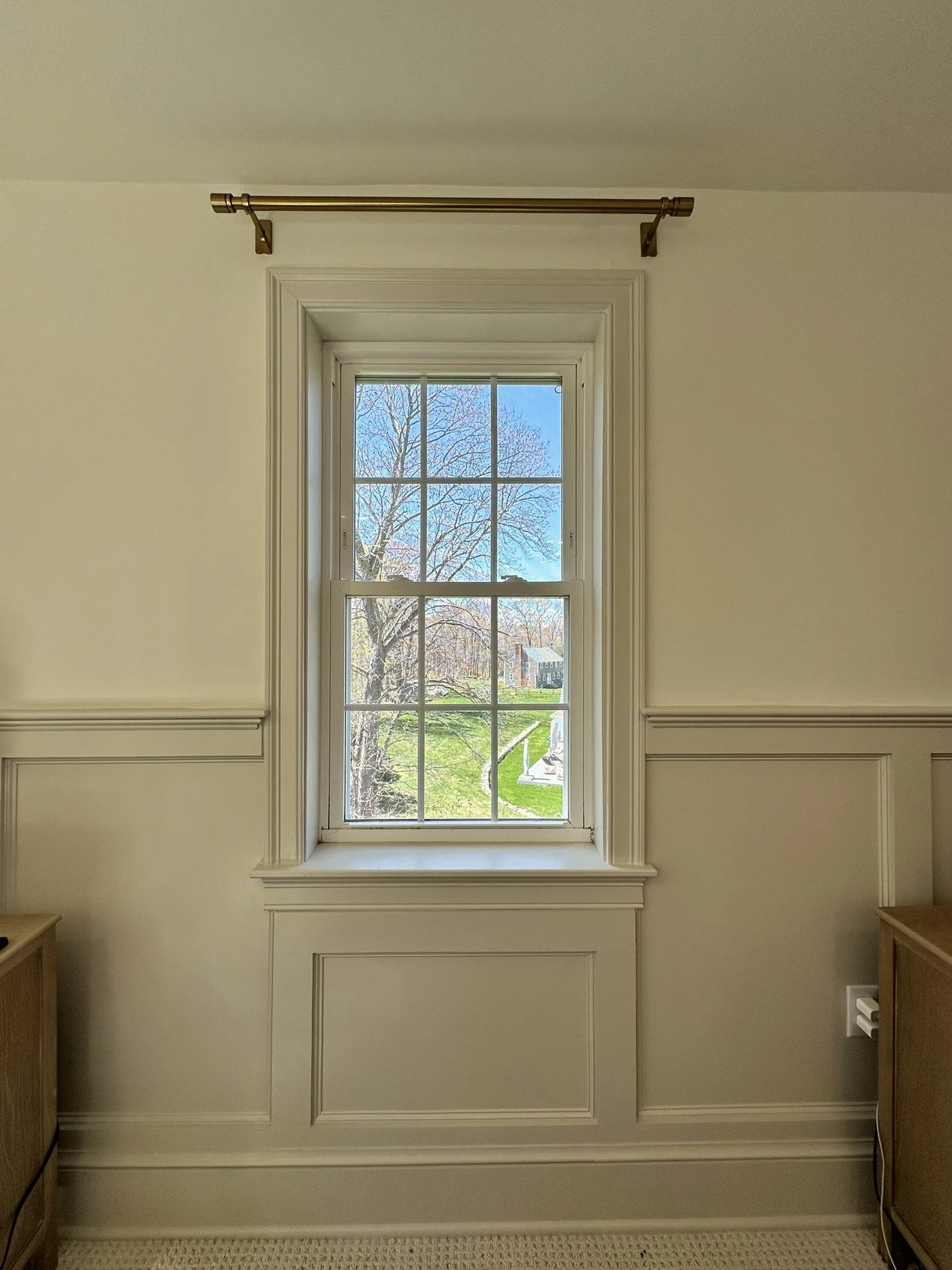 Custom window casing and wainscoting detail