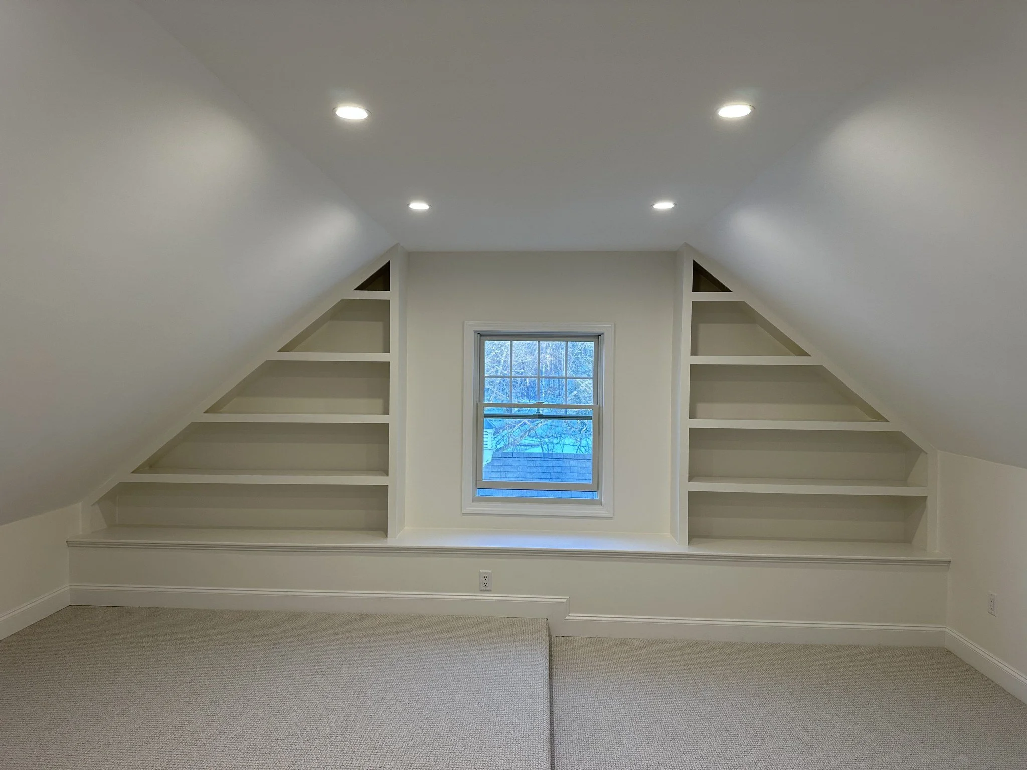 Custom built-in attic shelving