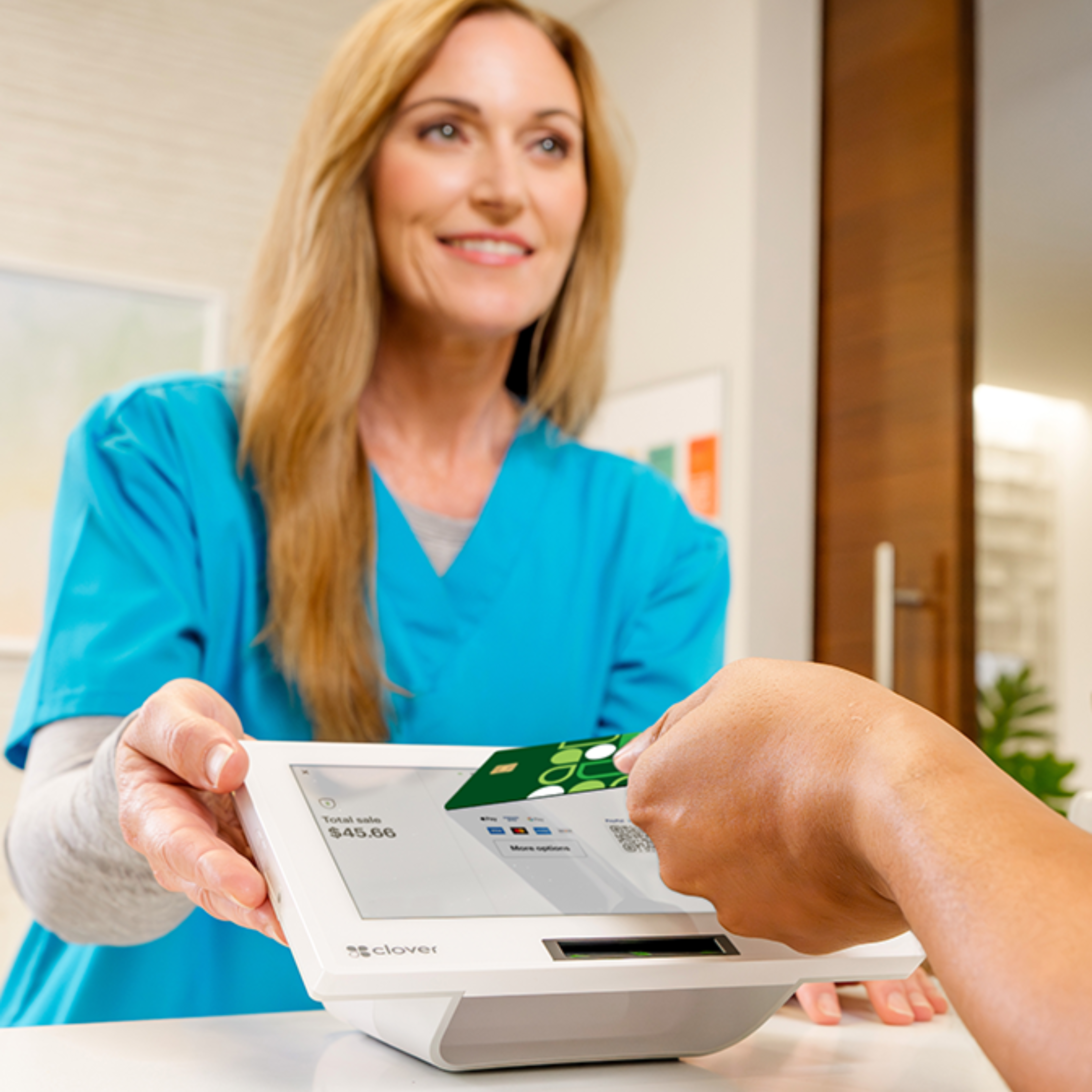 Patient making a payment at a medical office using Clover