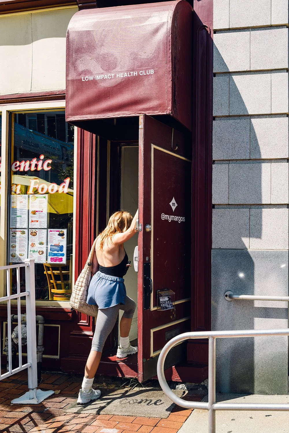 A member walking into the Margo's storefront on West Main Street