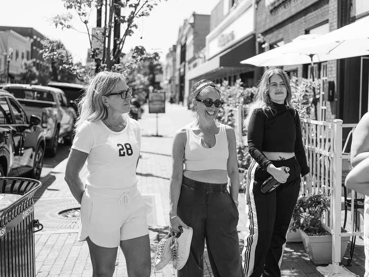 Members walking together in downtown Freehold