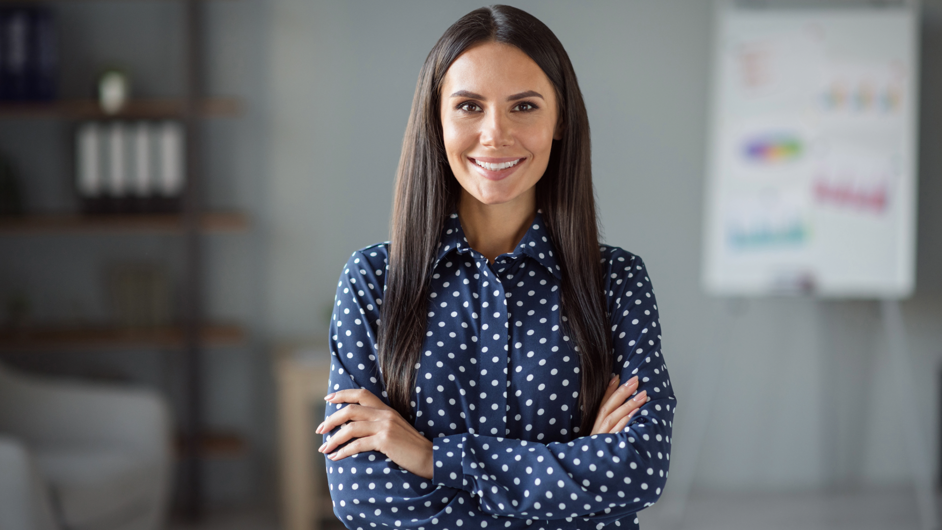 Woman standing in a professional office; illustrative agent imagery