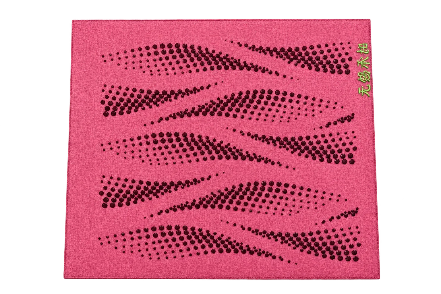 Raised dark flowing lines on a pink textile swatch