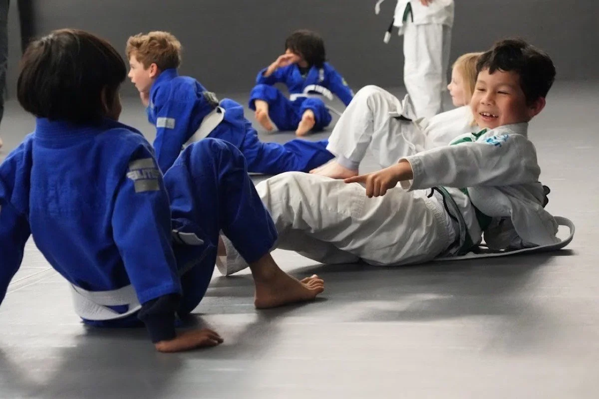 Kids training together on the mats