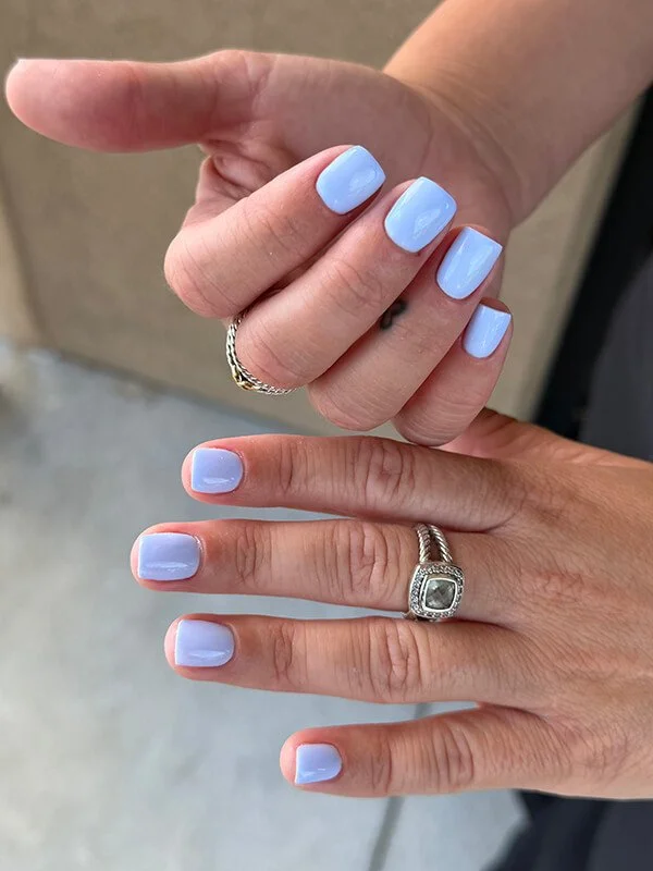 Pastel blue Russian gel manicure on short natural nails