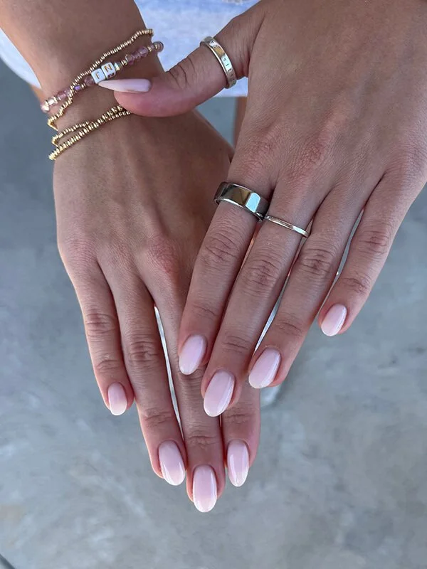 Soft pink Russian gel manicure on short oval natural nails