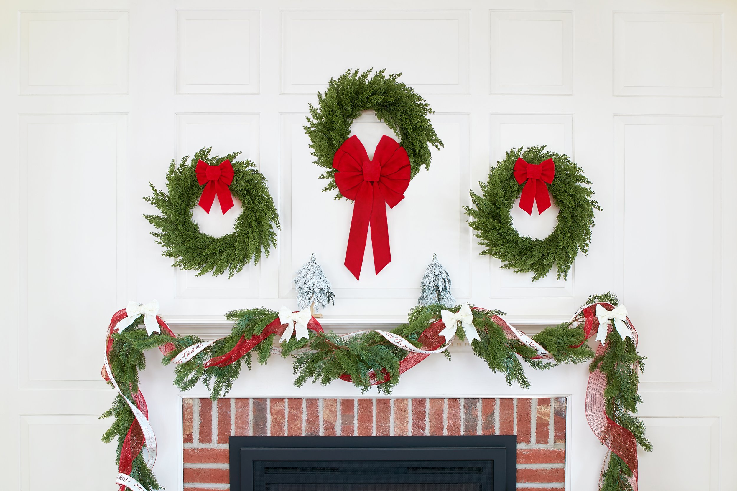 wreaths and bows and mantle decor made by Gwen Studios