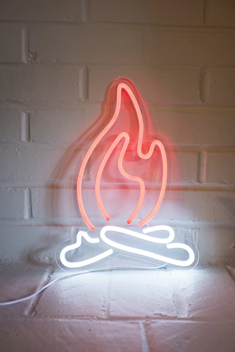 The neon campfire in 206 (decor only)