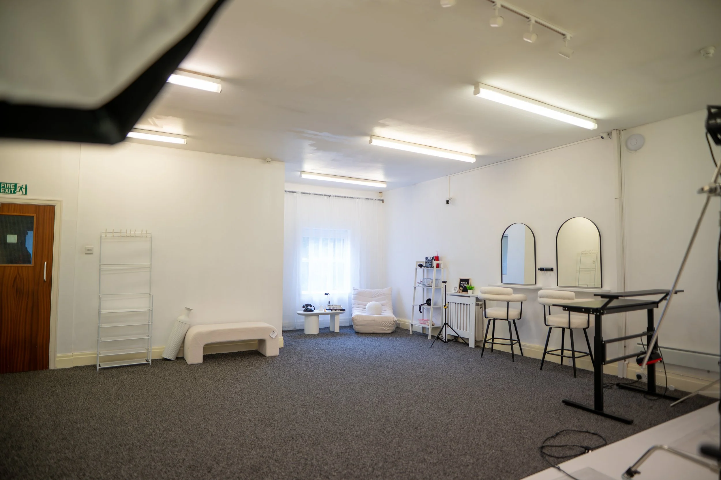 Studio wide shot — lighting, backdrops, space