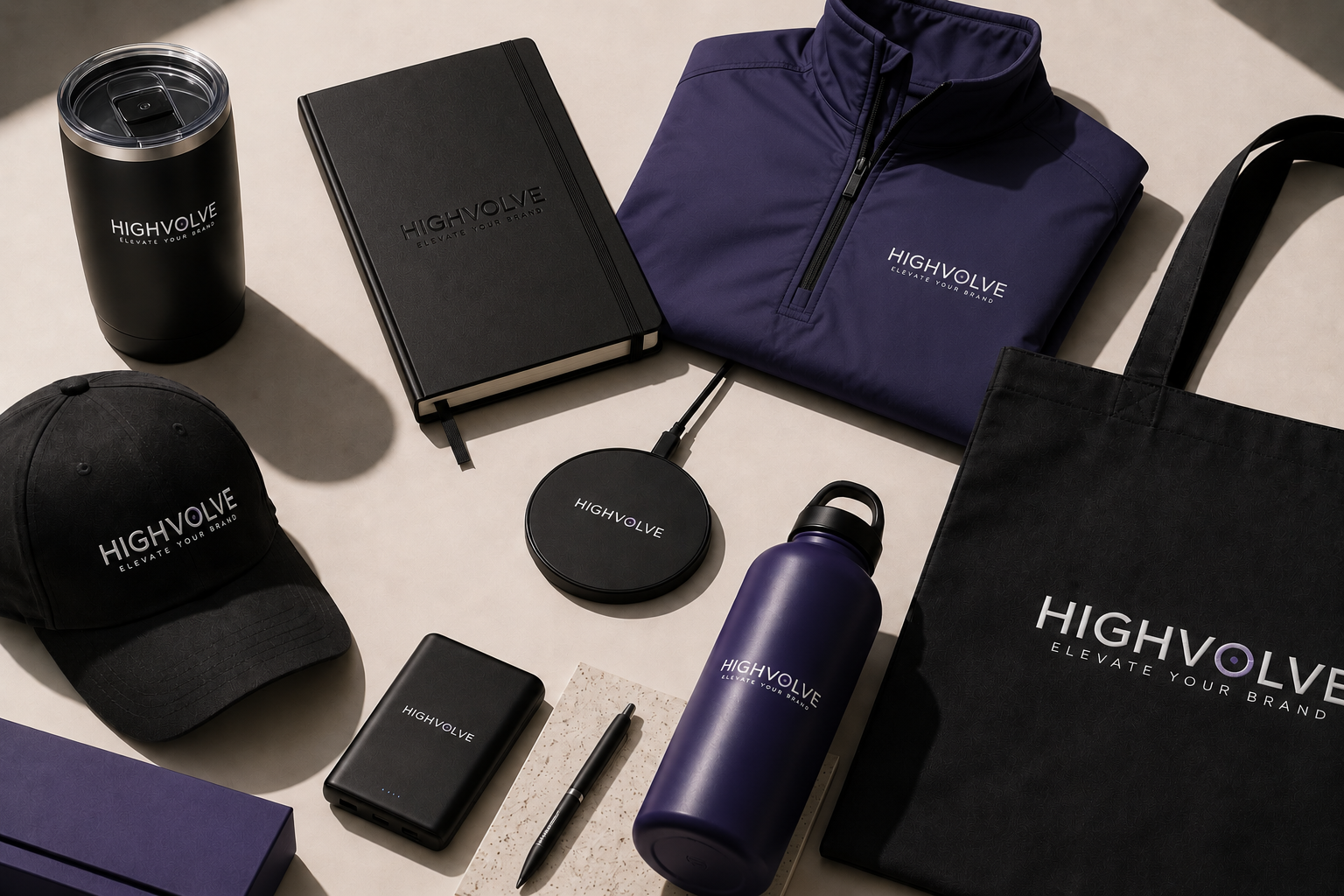 Custom trade show merchandise including branded apparel, drinkware, notebooks, tote bags, and tech accessories for Las Vegas events
