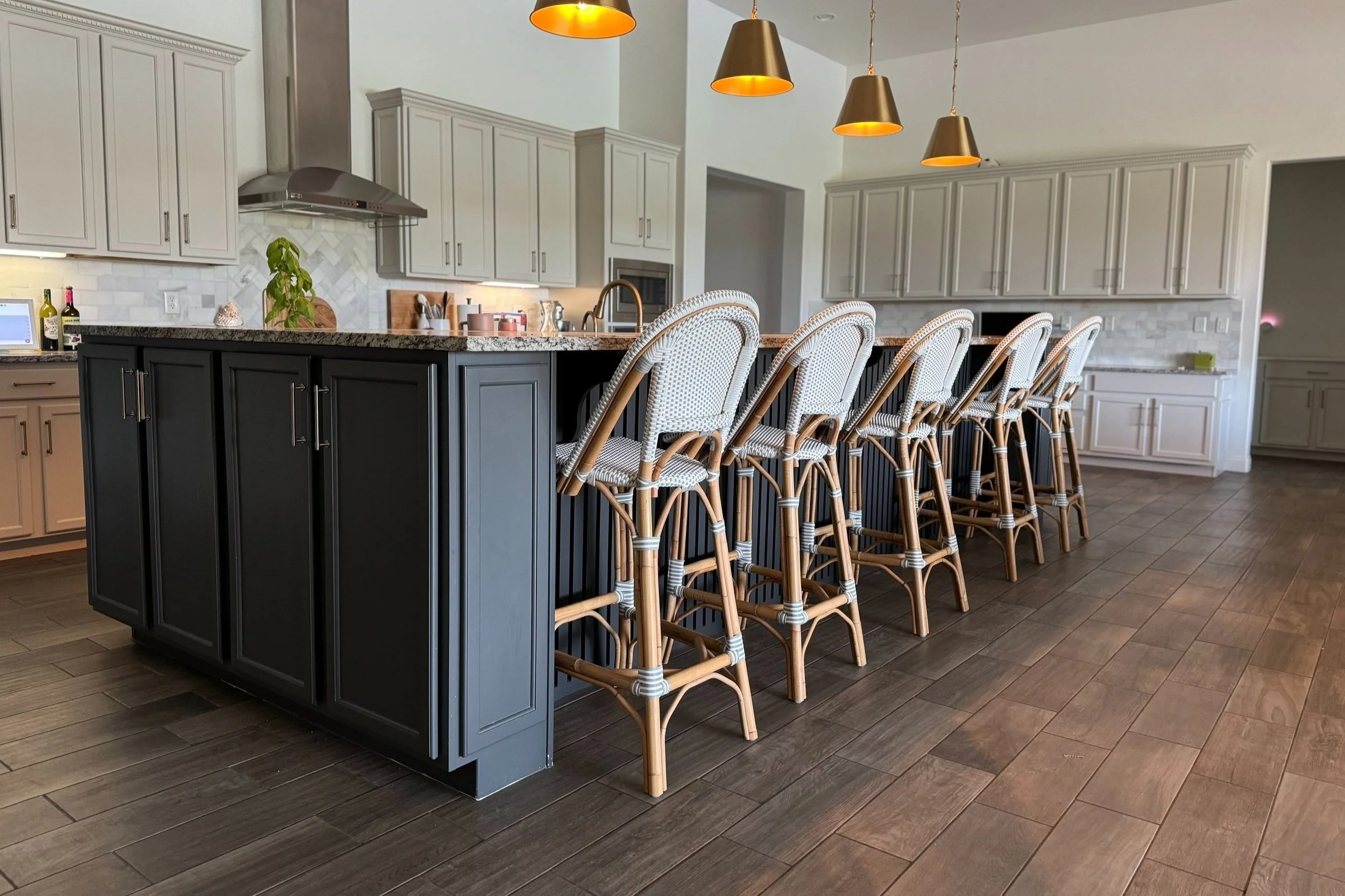 Completed dark painted KBK kitchen island with custom panel molding