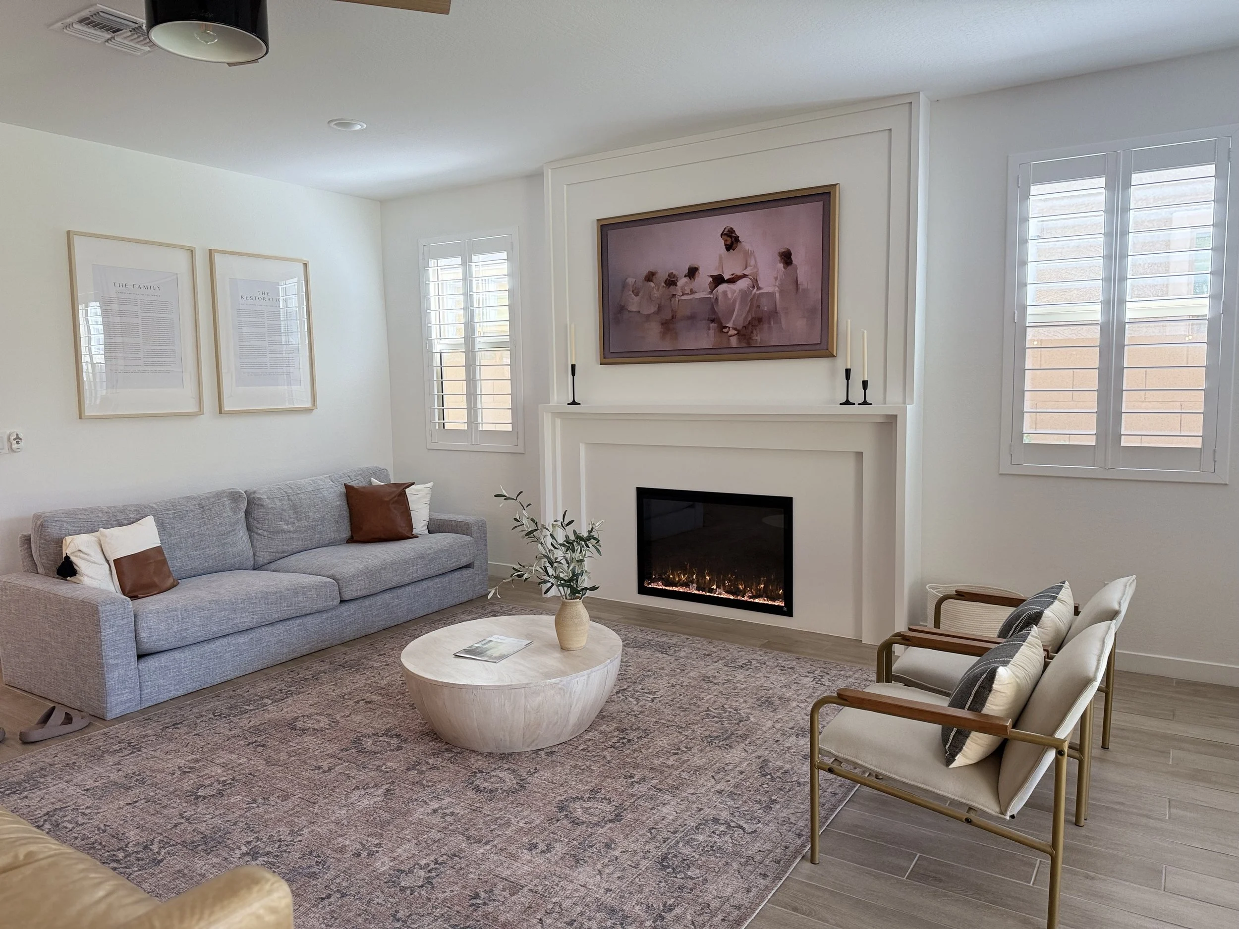 White mantel fireplace in the finished living room