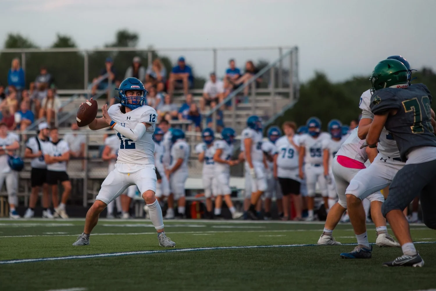 Football quarterback throwing