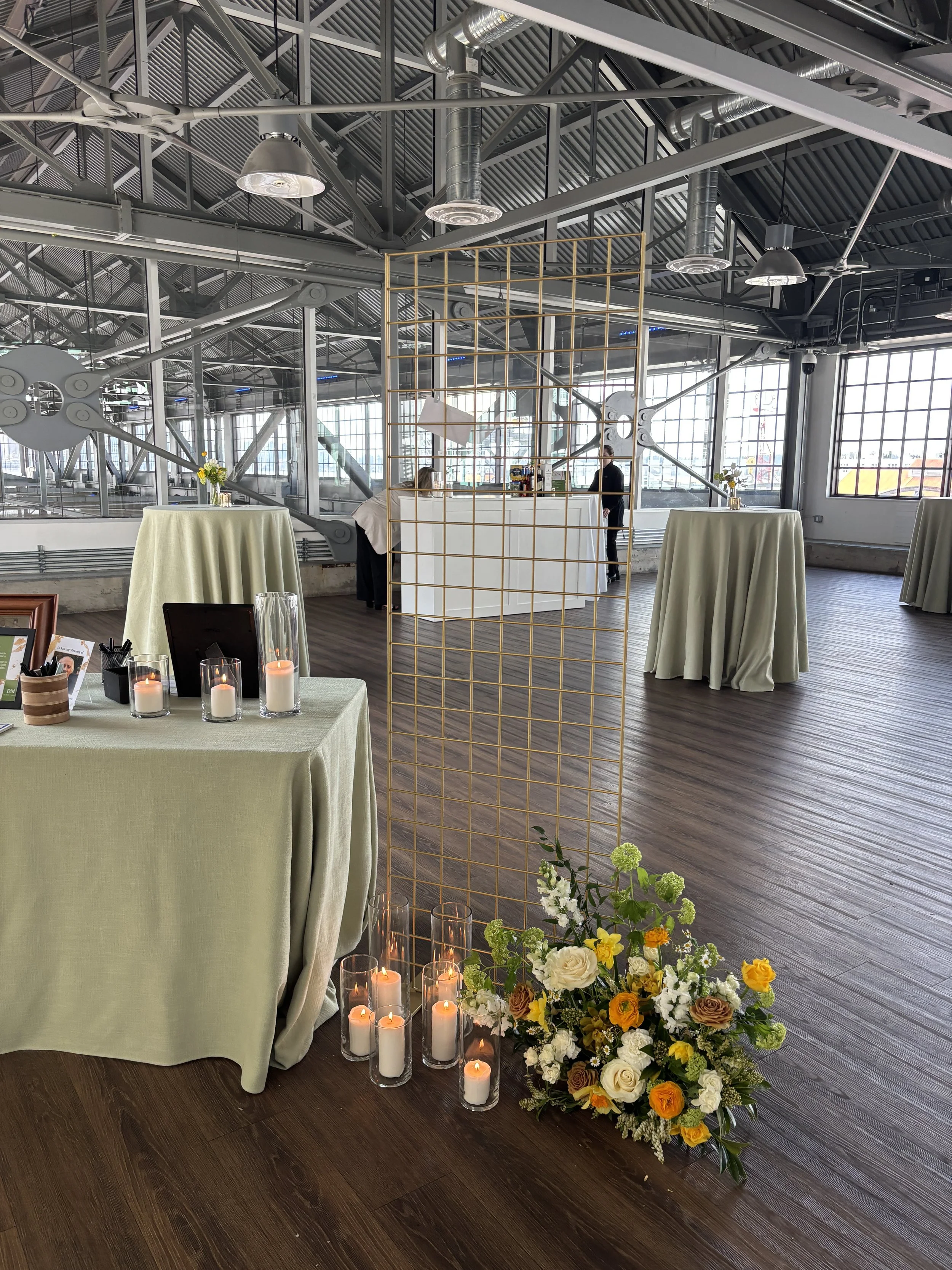 Intimate venue setup with florals