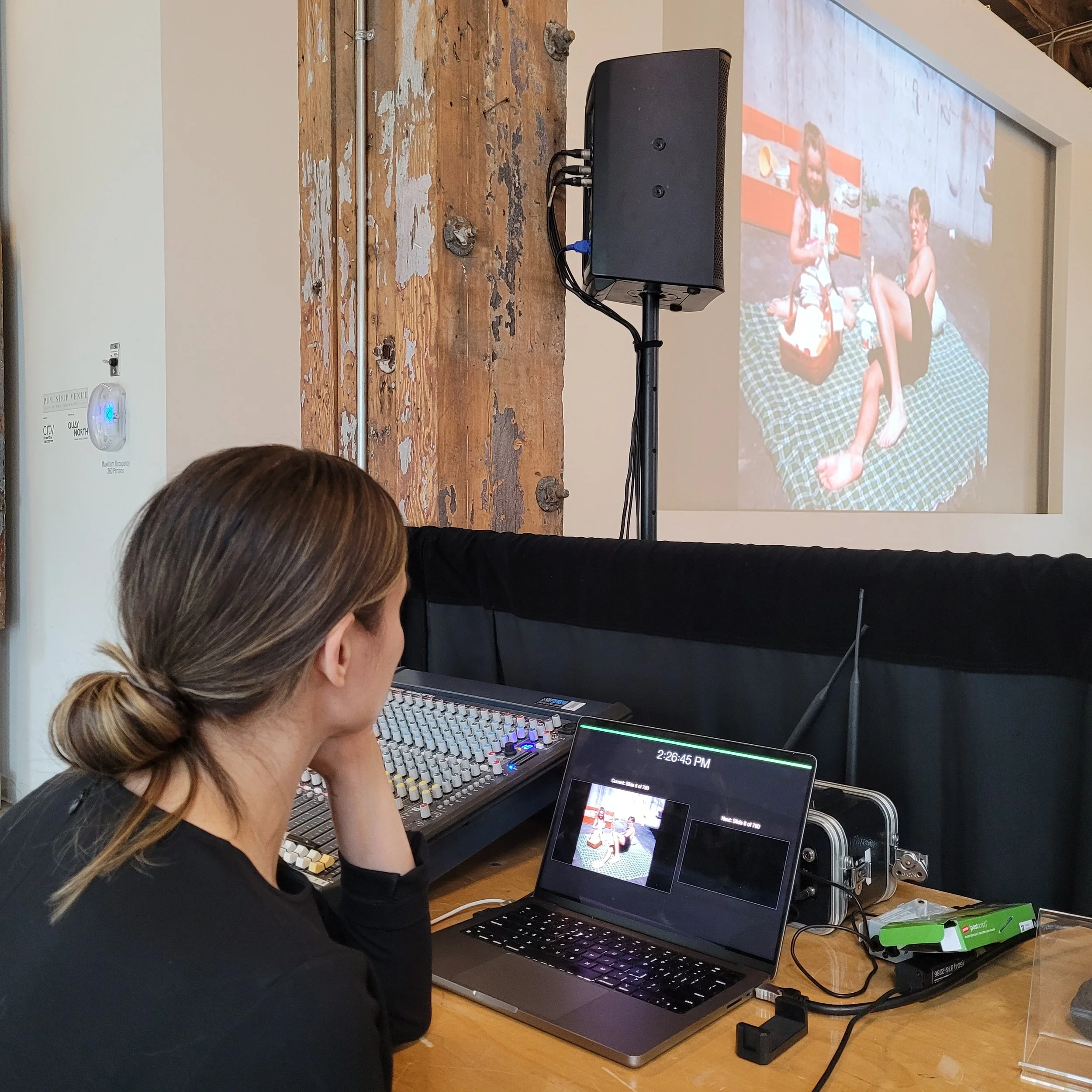 Christina Andreola at the tech table at a celebration of life
