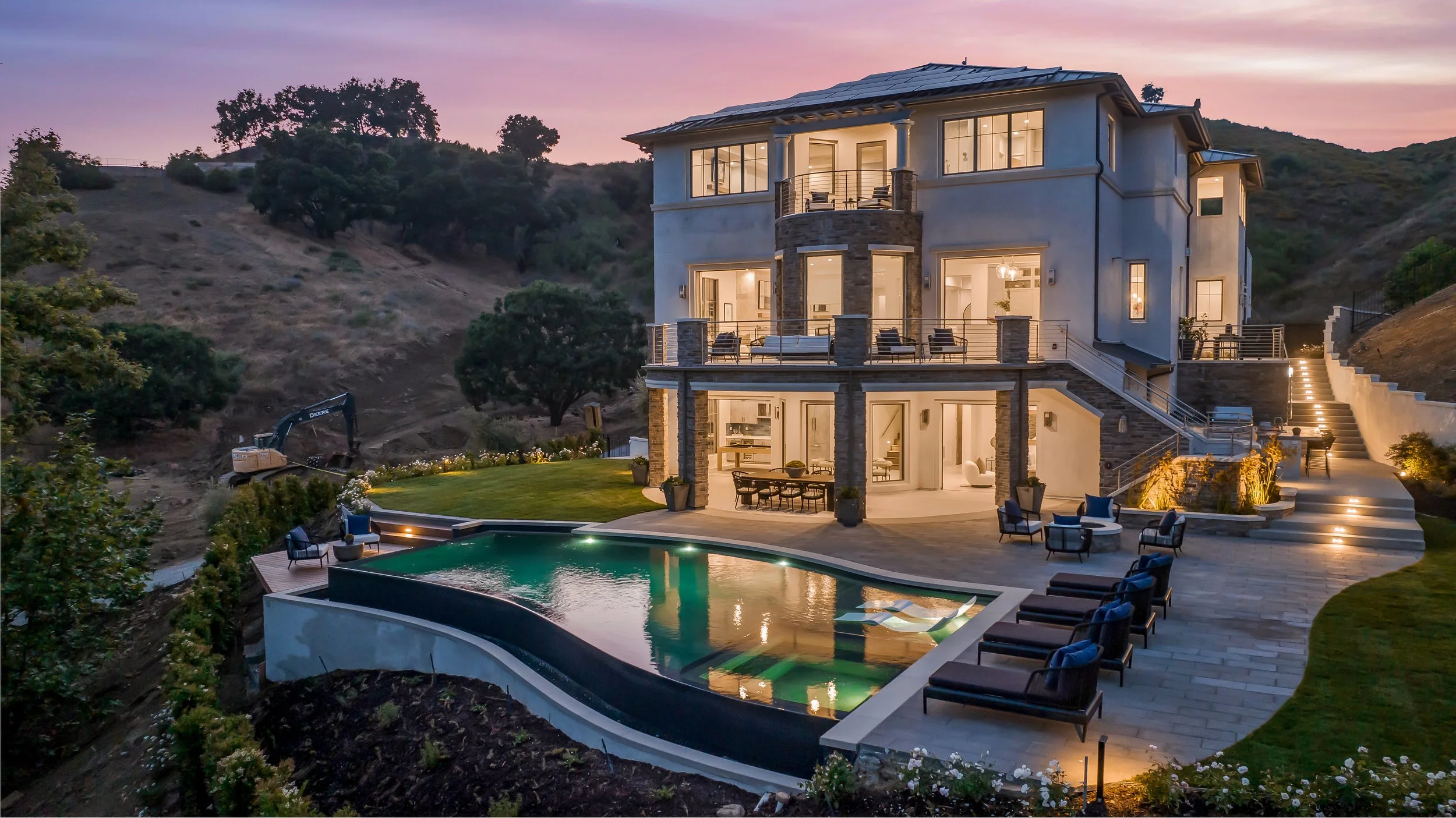 Outdoor living and pool addition remodel transformation