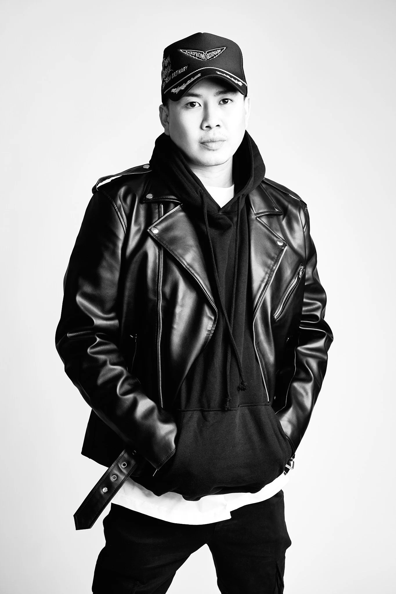 Far From Ordinary campaign leather jacket branded cap