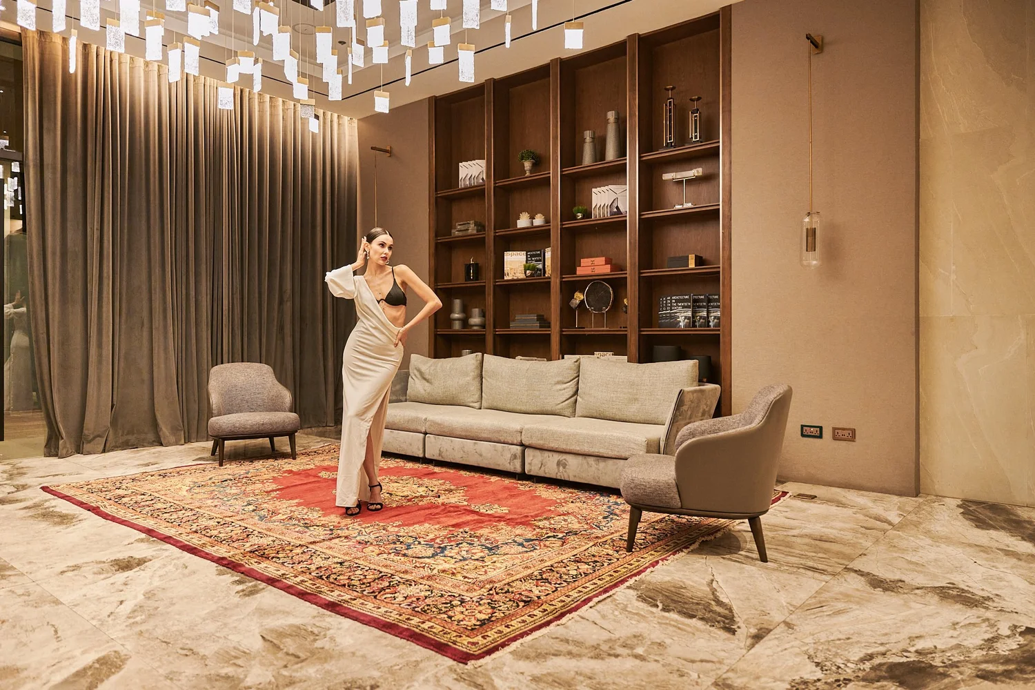 Farzam Carpets campaign model on red rug