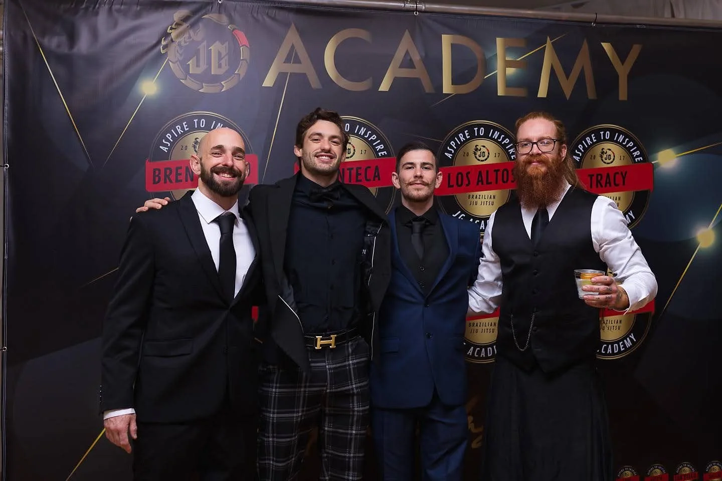 Logan with the JG Academy coaches at the academy gala