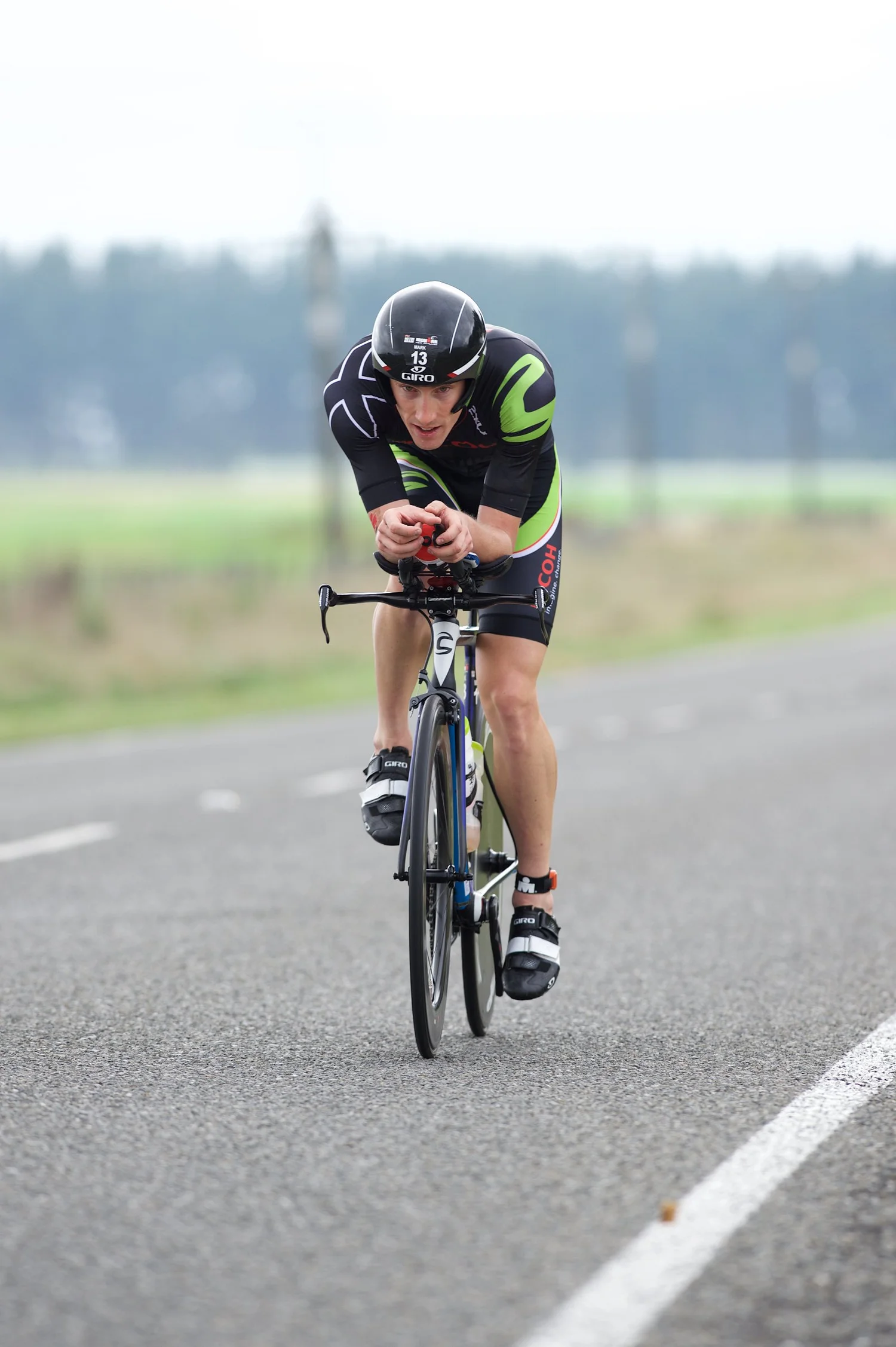 Mark Bowstead racing the IRONMAN New Zealand bike leg on the rural roads outside Taupō