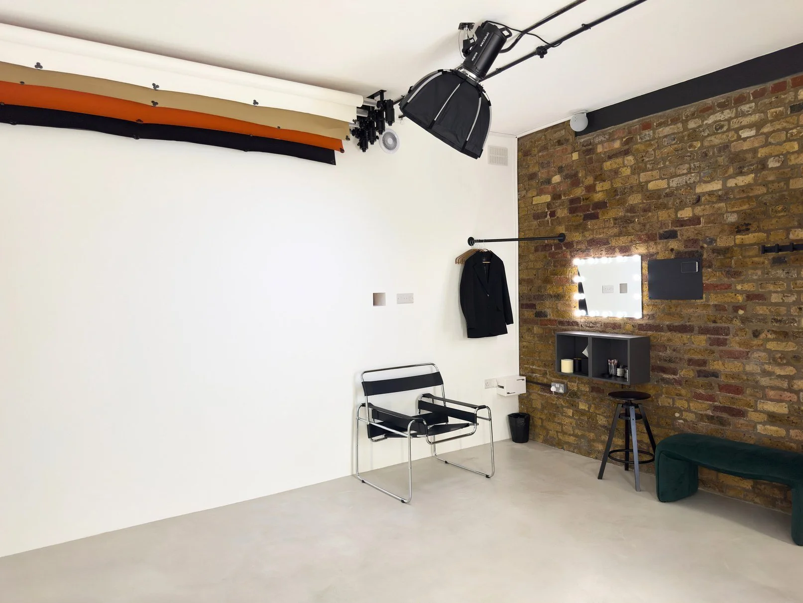The private studio with backdrops, lighting and makeup area