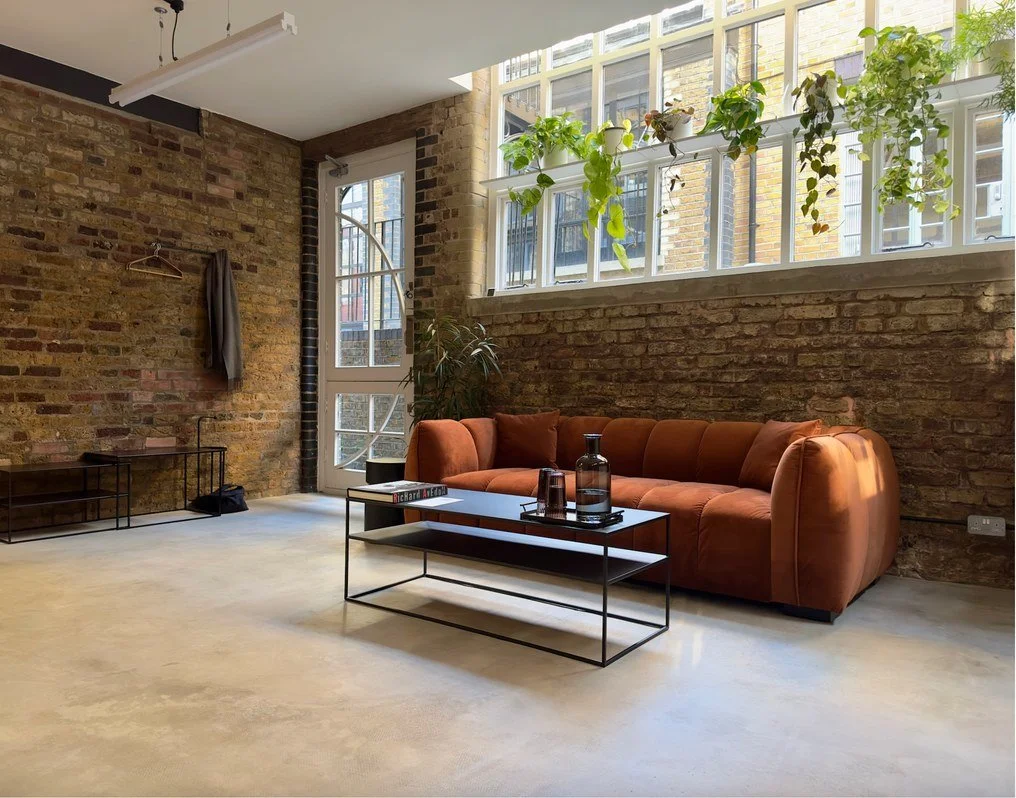 The reception lounge with sofa and natural light