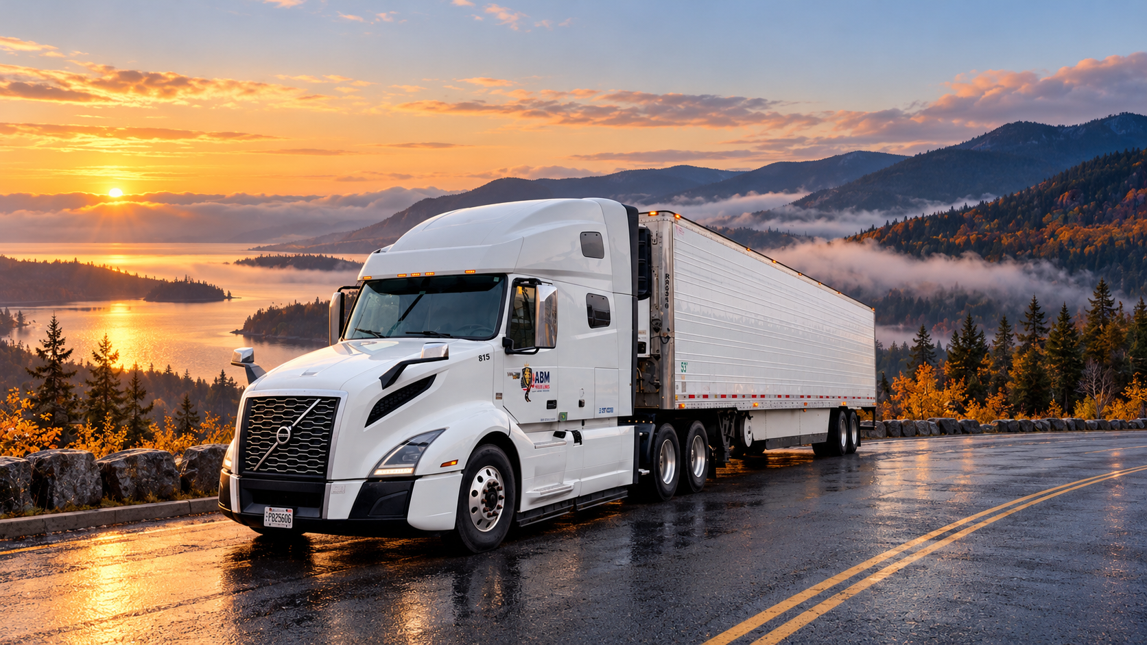 ABM Volvo Unit 815 overlooking an autumn lake at sunrise