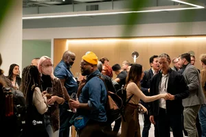 People mingling at an indoor networking event