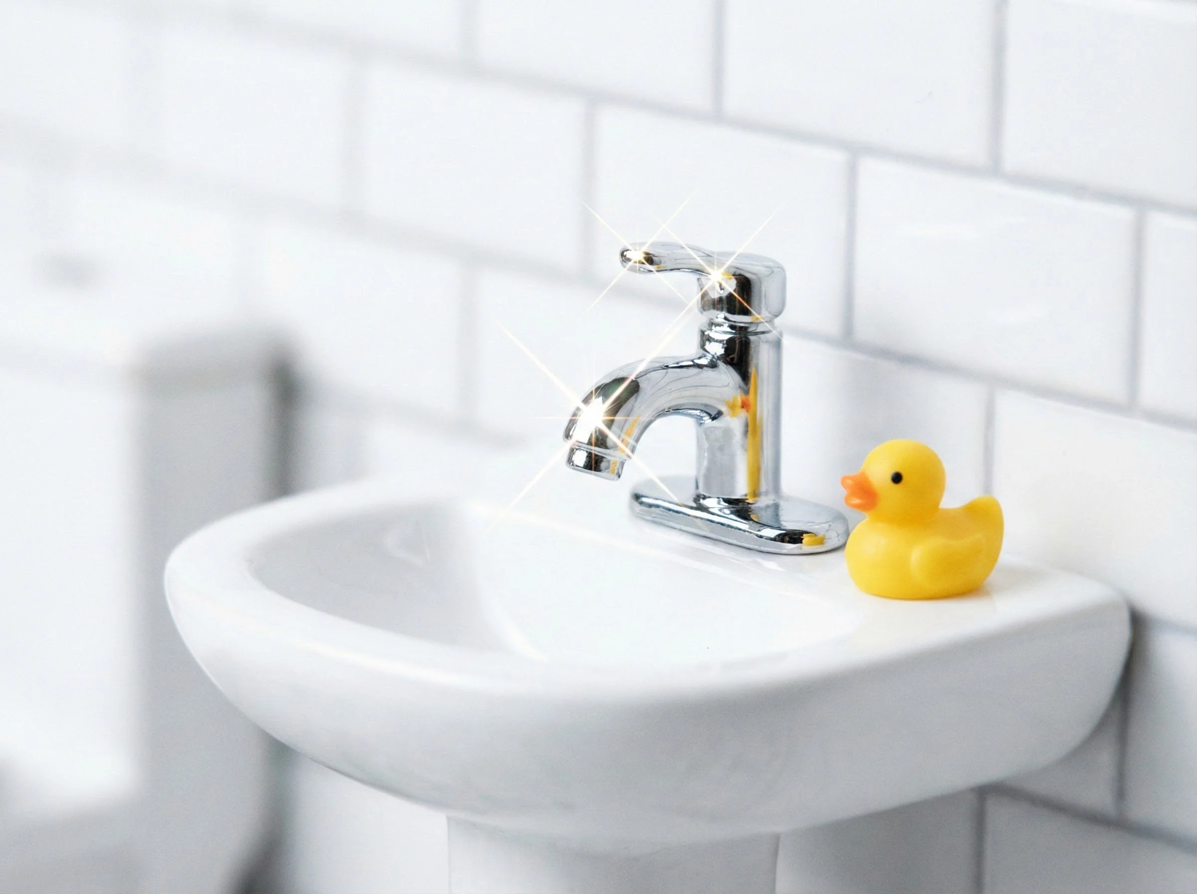 Sparkling miniature bathroom faucet