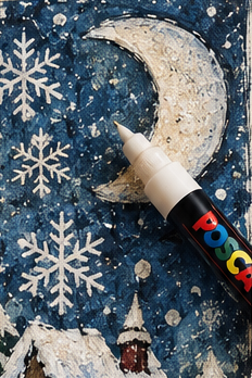 Paint-marker details and decorative accents added to the winter village