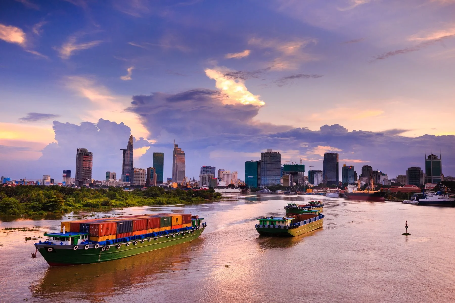 Cargo vessels moving through Ho Chi Minh City, Vietnam